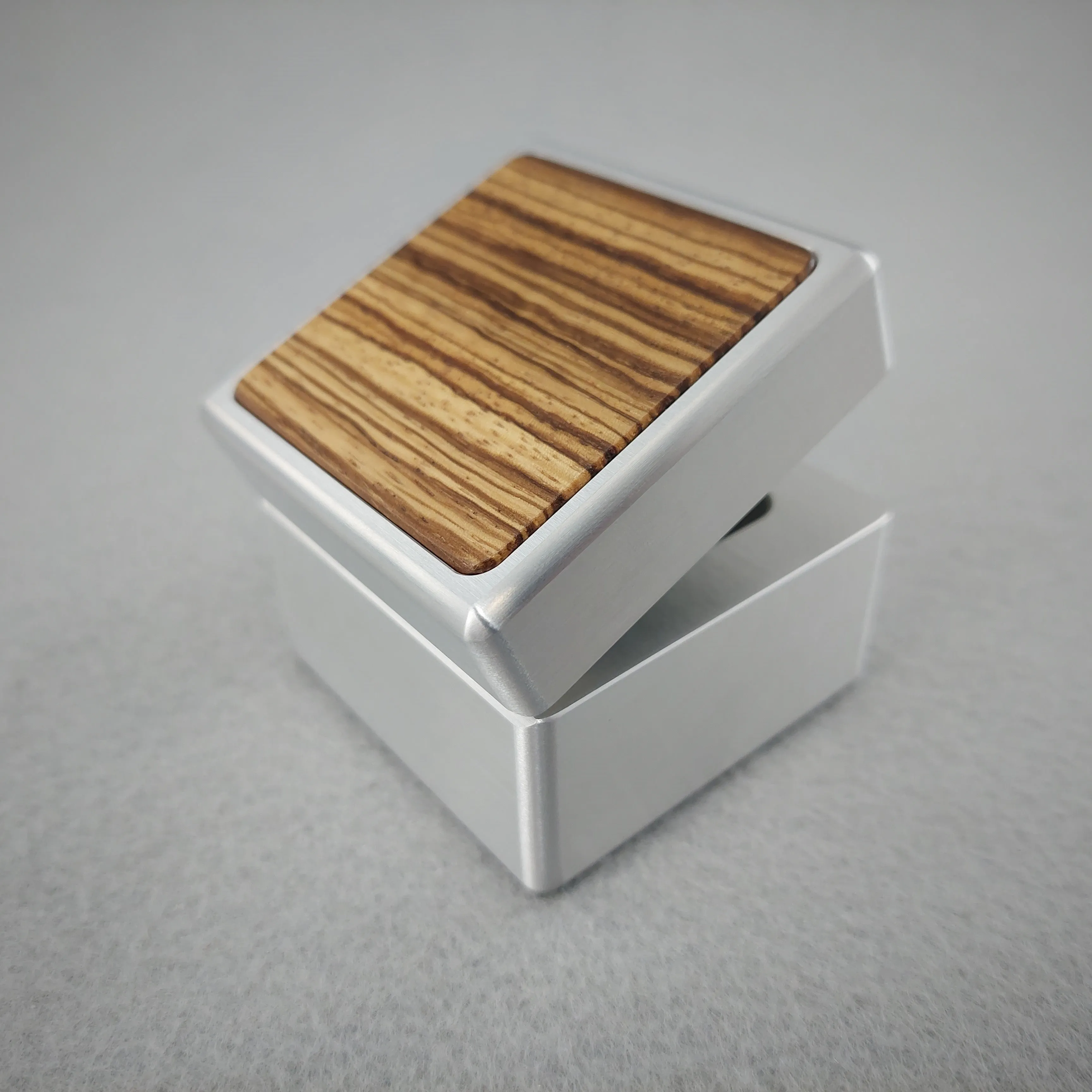 DPCustoms "Smooth Operator" Engagement Ring Box in Brushed Solid Aluminum and Brass, Featuring Leopardwood, Bloodwood, Zebrawood Inlays