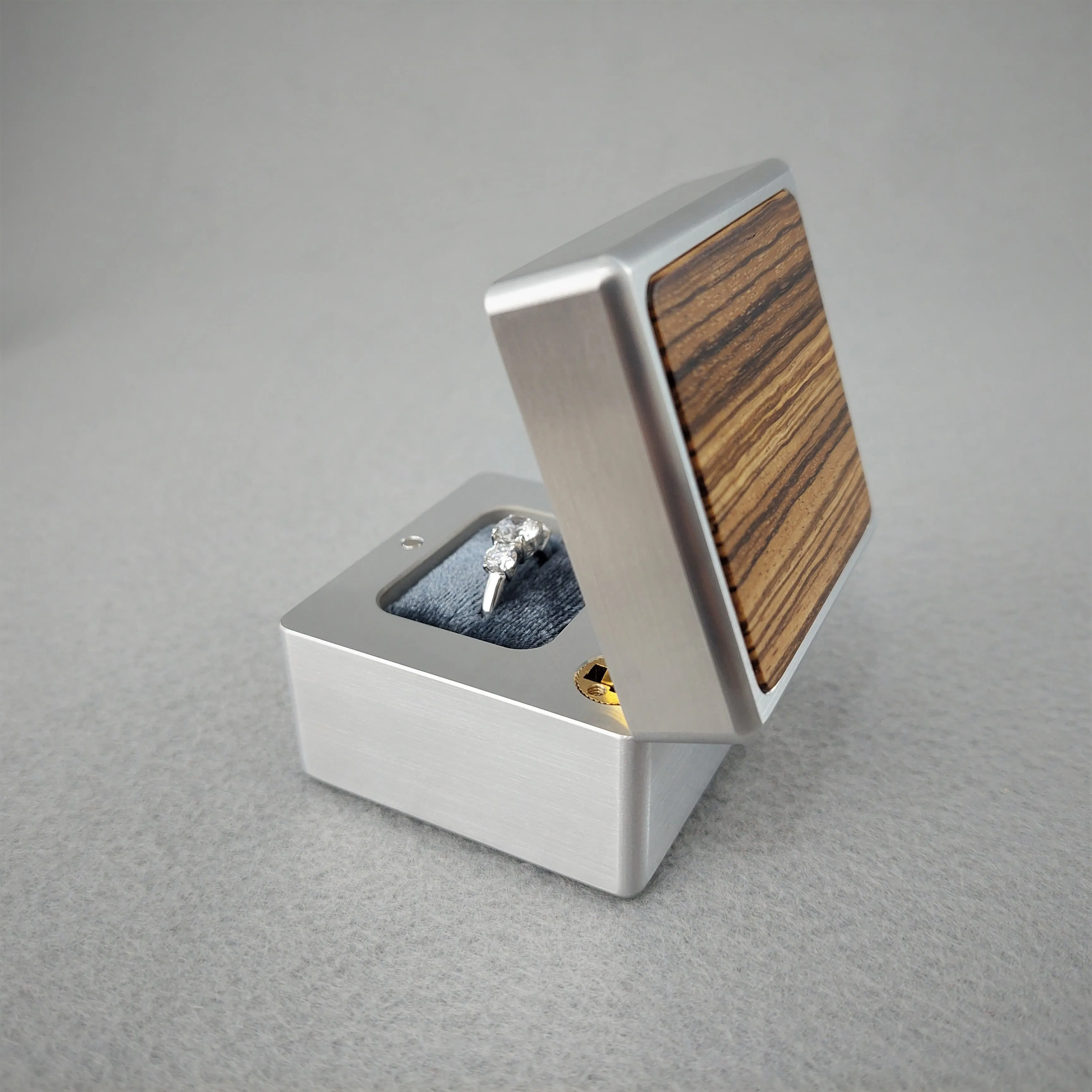 DPCustoms "Smooth Operator" Engagement Ring Box in Brushed Solid Aluminum and Brass, Featuring Leopardwood, Bloodwood, Zebrawood Inlays